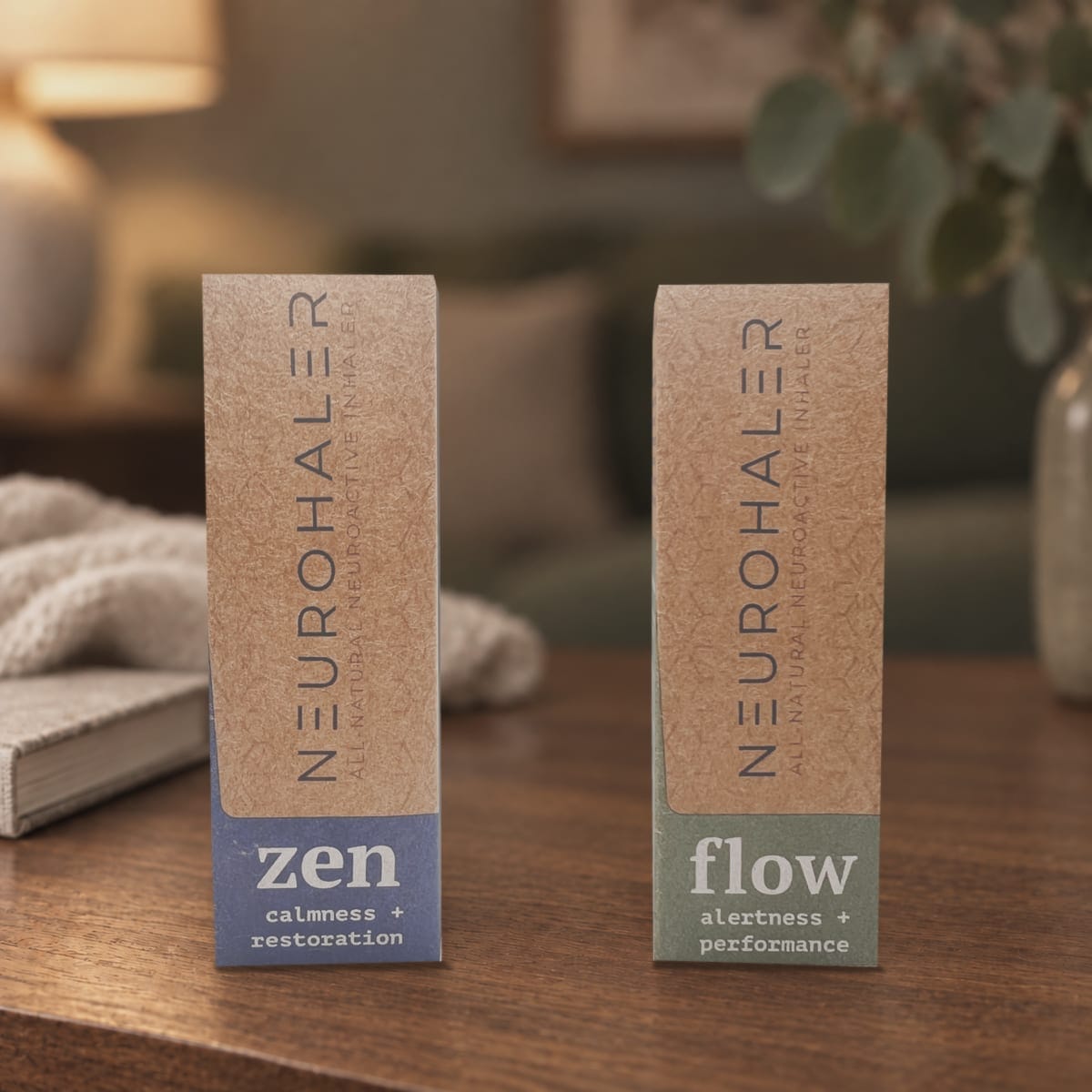 The Neurohaler ZEN and FLOW packets together on a walnut console beside cream linen